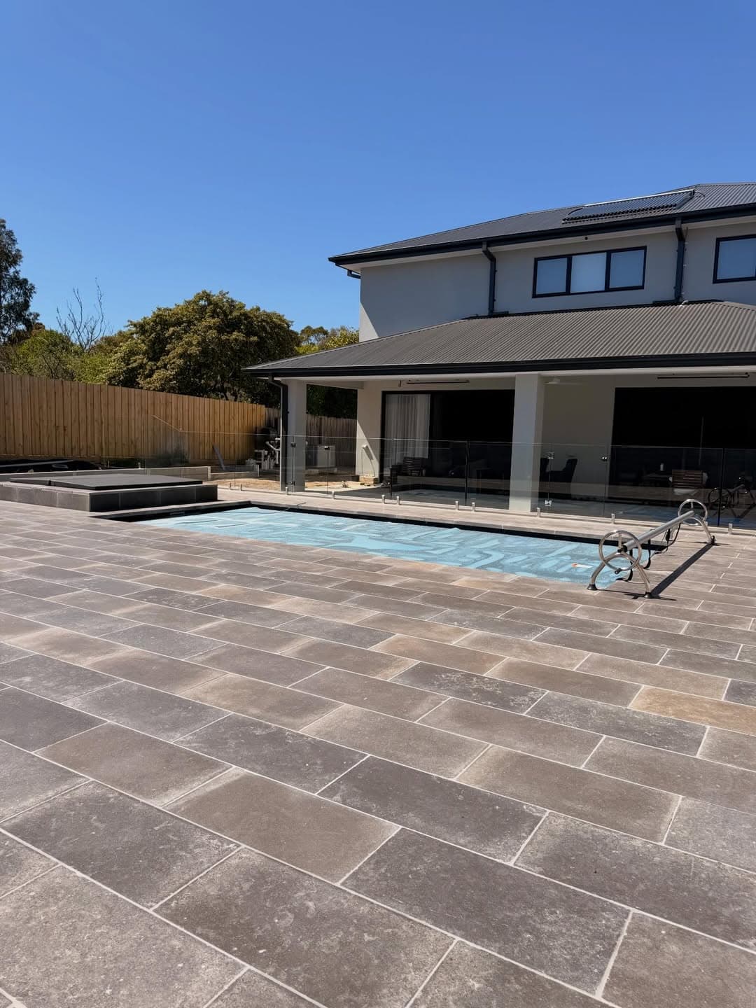 Heathmont residence — stone paving and pool